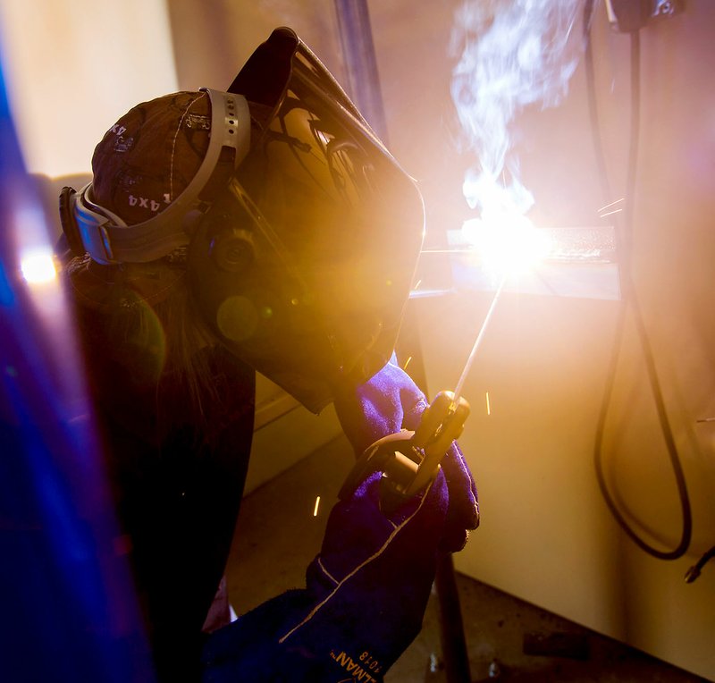 Photo by Jason Ivester Mirielle Still, Gravette High senior, works in the welding class on Thursday, Sept. 15, 2016, led by Northwest Technical Institute instructor Brian Wheeler at Gravette High School. Thirteen students from Gravette High, Decatur High and Bentonville High are participating in the new class.