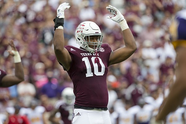 Texas A&M defensive lineman Daeshon Hall (10) gestures to the crowd during the first quarter of an NCAA college football game against Prairie View A&M Saturday, Sept. 10, 2016, in College Station, Texas. (AP Photo/Sam Craft)

