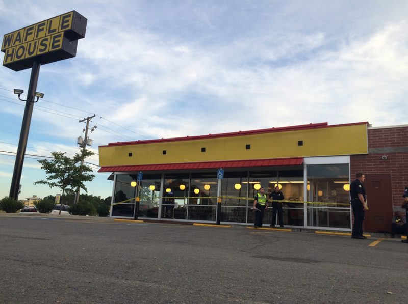 Police investigate a robbery at a Little Rock Waffle House Tuesday afternoon.
