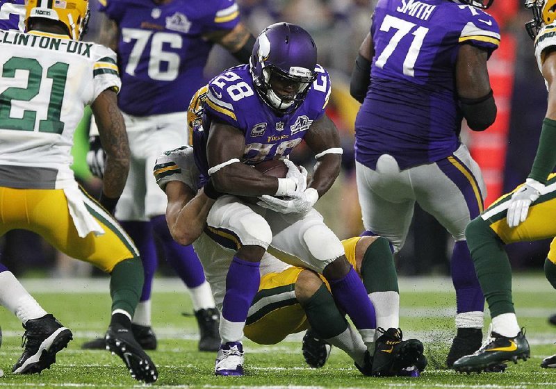 After rushing for just 50 yards through two games this season, Minnesota running back Adrian Peterson might be done for the year after tearing his meniscus Sunday against Green Bay.