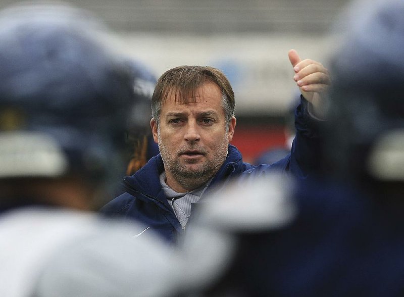 Pulaski Academy head coach Kevin Kelley gives instructions to his team in this file photo.
