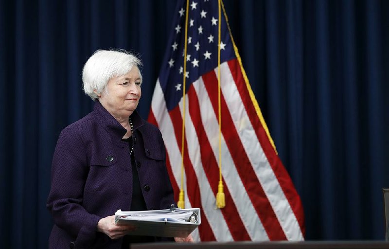 Federal Reserve Chairman Janet Yellen arrives Wednesday for a news conference in Washington. The Federal Reserve kept its key interest rate unchanged but signaled it will likely raise rates before year’s end.