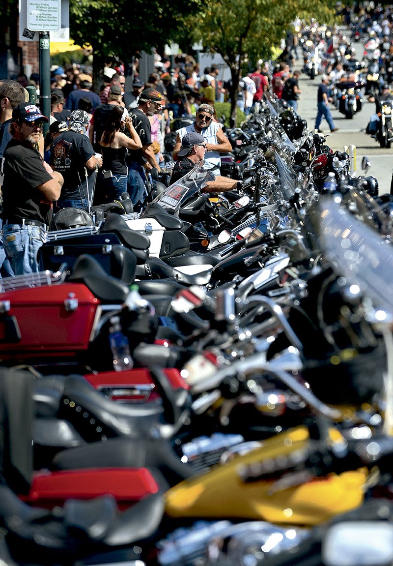 Motorcycles line Dickson Street during the 2015 Bikes, Blues & BBQ motorcycle rally.