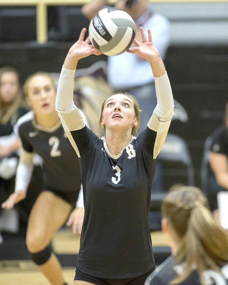 Bentonville's Baylee Barganier sets the ball Thursday at Bentonville High School.