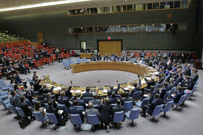 In this photo provided by the United Nations, the U.N. Security Council unanimously adopts a resolution on aviation security and safety, Thursday, Sept. 22, 2016 at United Nations headquarters. 