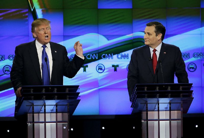 Donald Trump and Ted Cruz tangle during a Feb. 25 Republican presidential debate in Houston. Nicknamed “Lyin’ Ted” by Trump during the primary race, Cruz announced Friday that he would vote for the former adversary Cruz once called a “pathological liar” and “utterly amoral,” among other things.