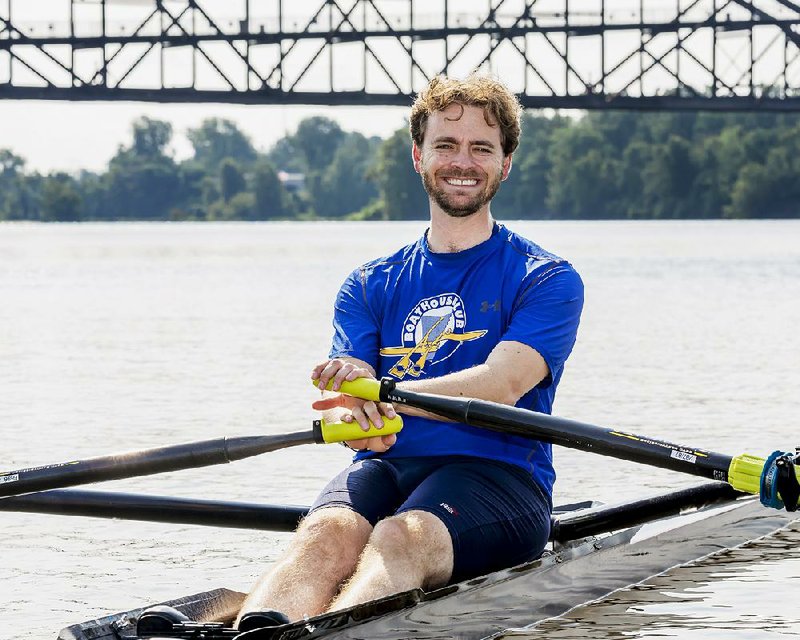 Arkansas Boathouse Club board member Anthony Jacuzzi takes a morning row on the Arkansas River, getting ready for the Six Bridges Regatta. The regatta aims to promote the sport of rowing in central Arkansas.