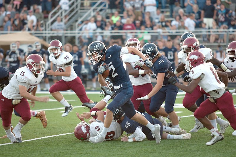 NWA Democrat-Gazette/MARK STALLINGS Kade Orlicek (2) of Greenwood looks for running room against the Texarkana defense Friday in Greenwood.