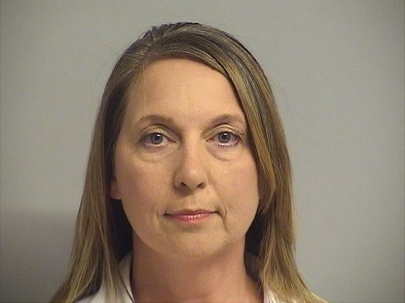 This photo provided by Tulsa County Inmate Information Center shows Tulsa police officer Betty Shelby. Tulsa County jail records show that Shelby turned herself in early Friday, Sept. 23, 2016, hours after prosecutors charged her with first-degree manslaughter in the death of Terence Crutcher. (Tulsa County Inmate Information Center via AP)