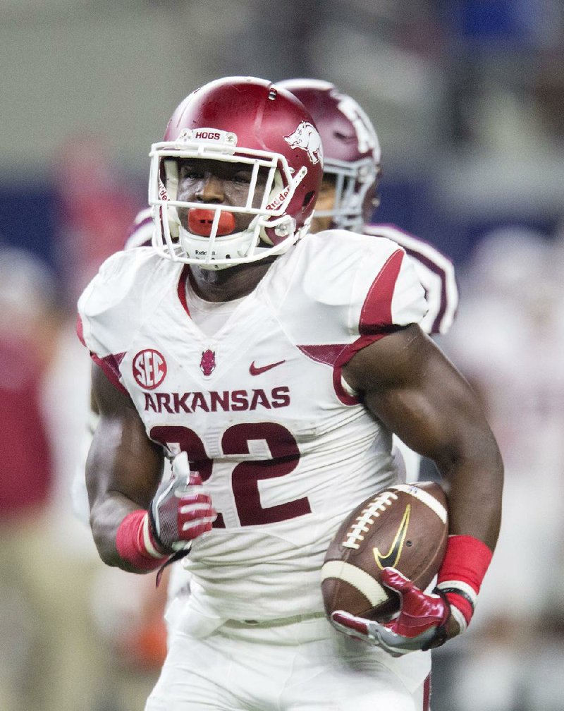 Arkansas running back Rawleigh Williams looks for running room in the first half. The Razorbacks were held to 1 rushing yard in the first quarter.