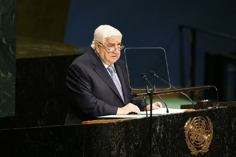 Syria's Foreign Minister Walid al-Moallem addresses the 71st session of the United Nations General Assembly at U.N. headquarters, Saturday, Sept. 24, 2016. 