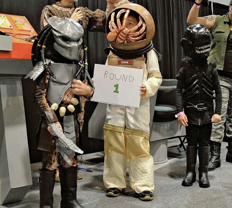 The Sentinel-Record/Mara Kuhn SHOWCASE: From left, Ari Lasagna, 6, Toby Lasagna, 8, and Riley Lasagna, 6, take part in the Cosplay Showcase at Spa-Con on Saturday at the Hot Springs Convention Center.