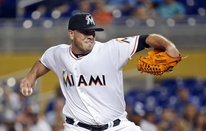 FILE - In this Friday, Sept. 9, 2016, file photo, Miami Marlins' Jose Fernandez pitches during the first inning of a baseball game against the Los Angeles Dodgers, in Miami. The Marlins announced Sunday, Sept. 25, 2016, that ace right-hander Fernandez has died. The U.S. Coast Guard says Fernandez was one of three people killed in a boat crash off Miami Beach early Sunday.