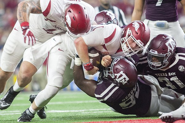 Arkansas junior quarterback Austin Allen tries to get into the end zone during the third quarter against Texas A&M on Saturday, Sept. 24, 2016, at AT&T Stadium in Arlington, Texas. The play was reviewed and Arkansas turned the ball over on downs on the next play.