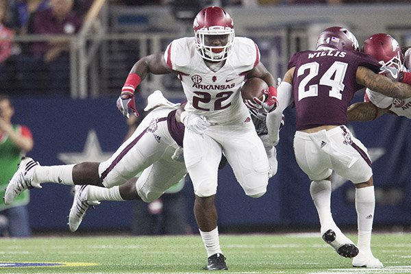 Arkansas running back Rawleigh Williams carries the ball during a game against Texas A&M on Saturday, Sept. 24, 2016, in Arlington, Texas. 