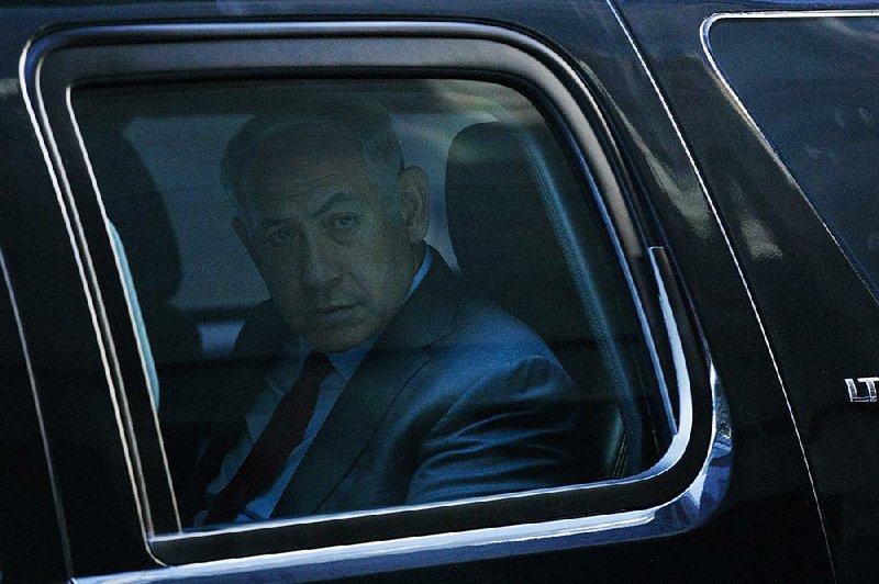 Israeli Prime Minister Benjamin Netanyahu departs Sunday after a meeting with Republican presidential candidate Donald Trump at Trump Tower in New York.