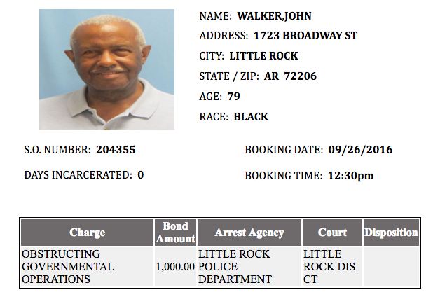 This screenshot from the Pulaski County jail website shows John Walker's booking mug and the misdemeanor charge filed against him.