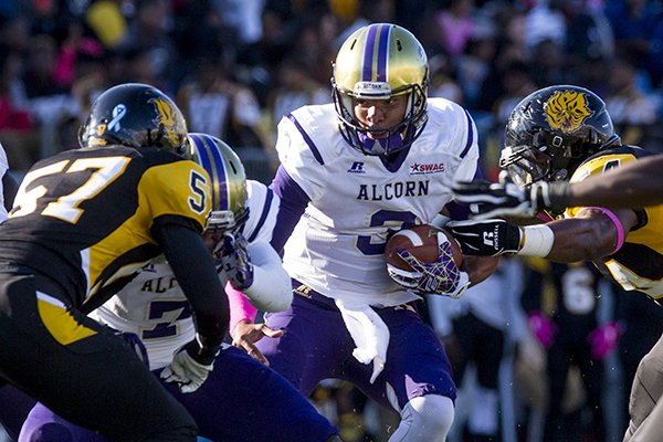 Alcorn State quarterback John Gibbs Jr. keeps the ball for a run during their game against Arkansas-Pine Bluff on Saturday, Oct. 3, 2015, at War Memorial Stadium in Little Rock.