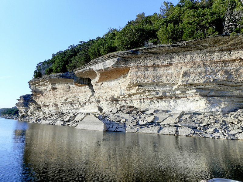 Photo by Xyta Lucas The Red Bluffs on Beaver Lake was one of the many scenic spots visited during the Sunset Cruise on Beaver Lake offered by Hobbs State Park.