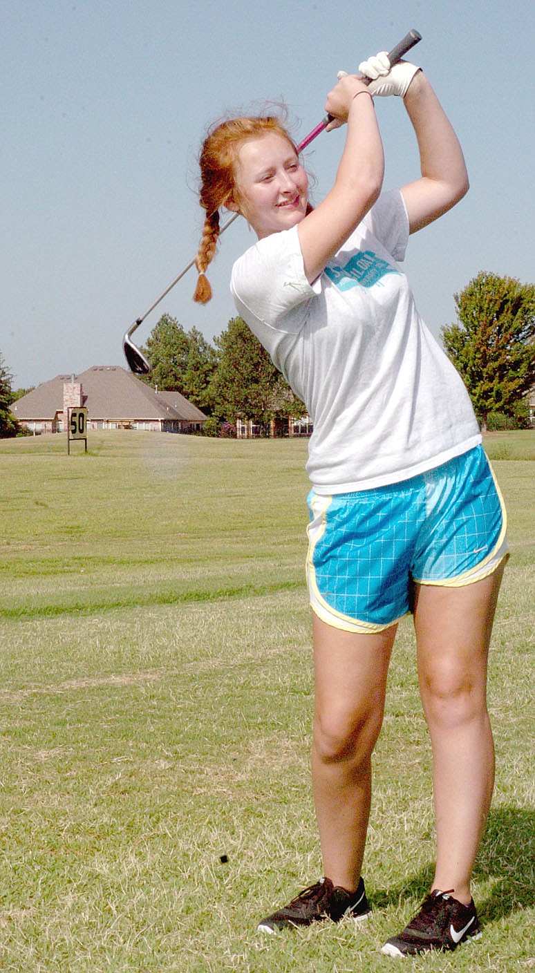 MARK HUMPHREY ENTERPRISE-LEADER Farmington senior Camden Burris helped the Lady Cardinals qualify for the state 5A golf tournament. The Farmington Lady Cardinals girls golf team placed third at district and qualified for the 5A state tournament which will be held Wednesday at Hot Springs. Team members include: Burris, Brooklyn Warren, Jordan Horn, and Jaine Amerine.