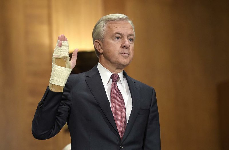 Wells Fargo Chief Executive Officer John Stumpf is sworn in on Capitol Hill in Washington, Tuesday, Sept. 20, 2016, prior to testifying before Senate Banking Committee.