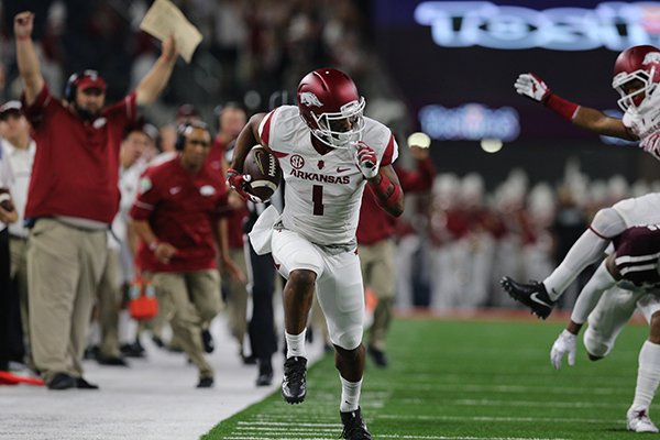 Arkansas receiver Jared Cornelius runs after the catch during a game against Texas A&M on Saturday, Sept. 24, 2016, in Fayetteville. 