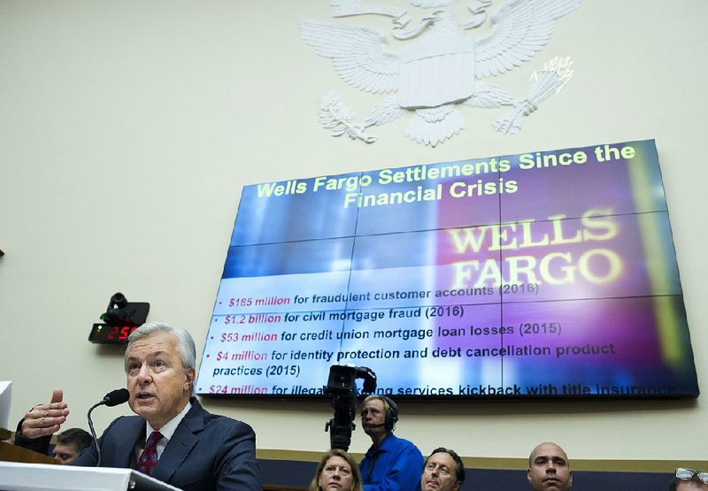 Wells Fargo CEO John Stumpf testifies Thursday on Capitol Hill. He told the House Financial Services Committee that he is “deeply sorry” about Wells Fargo’s past sales practices.