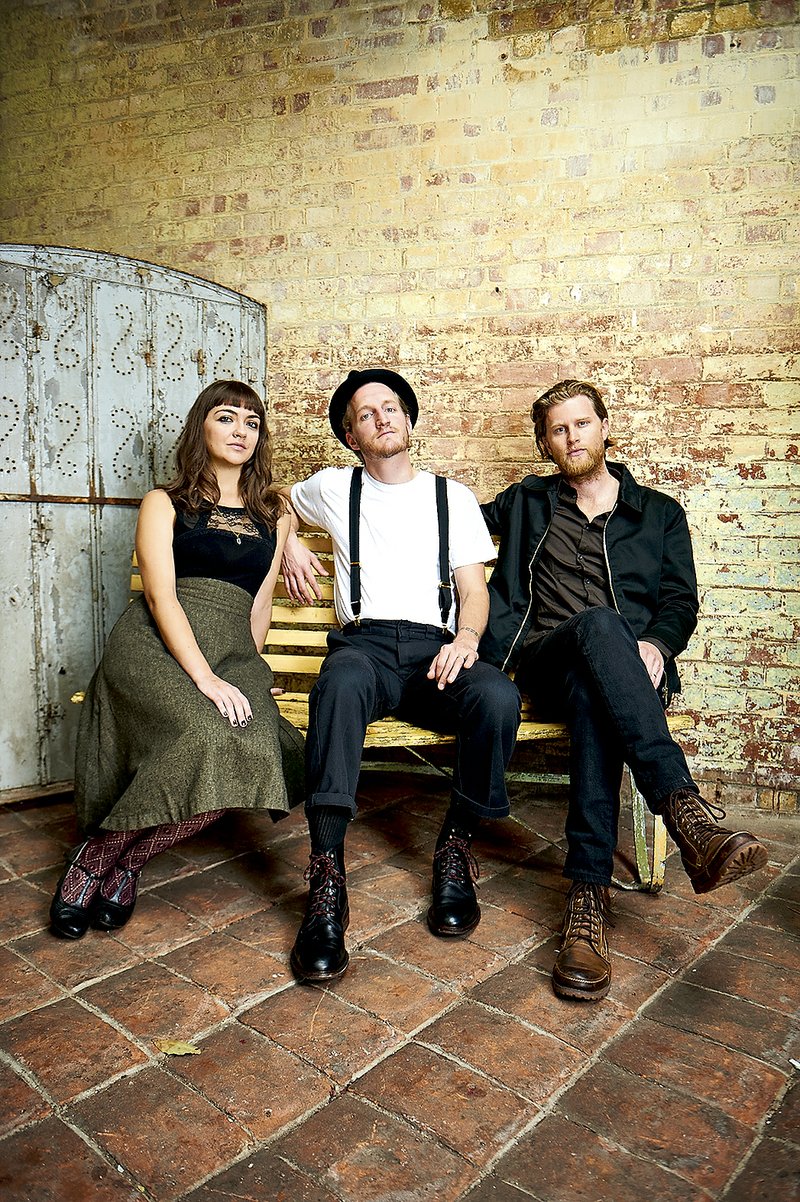 “You can get amazingly personal, and people still relate,” says songwriter Wesley Schultz, right, of The Lumineers. “It’s actually kind of fascinating that people take something and run with it once you put it out in the world. You’re creating something and it’s stirring something in someone else.” The trio will perform Saturday at the Walmart AMP in Rogers.