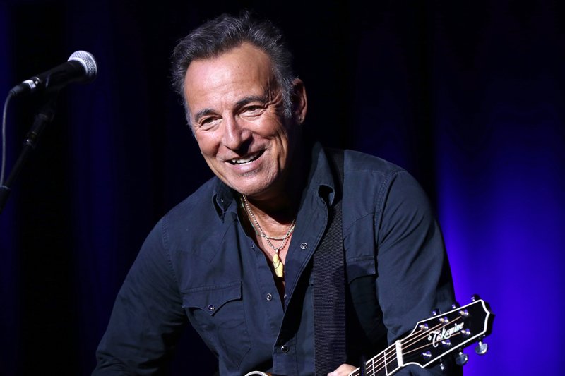 FILE - In this Nov. 10, 2015 file photo, Bruce Springsteen performs at the 9th Annual Stand Up For Heroes event in New York. A Philadelphia fifth-grader ditched school for the chance to meet the rock legend at his book signing Thursday, Sept. 30, 2016, and The Philadelphia Inquirer reports “The Boss” gladly played along by signing the boy’s absence excuse note. (Photo by Greg Allen/Invision/AP, File)
