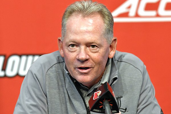 FILE — Bobby Petrino, then the head coach at Louisville, responds to a question during his weekly press conference in this 2016 file photo.  (AP Photo/Timothy D. Easley)

