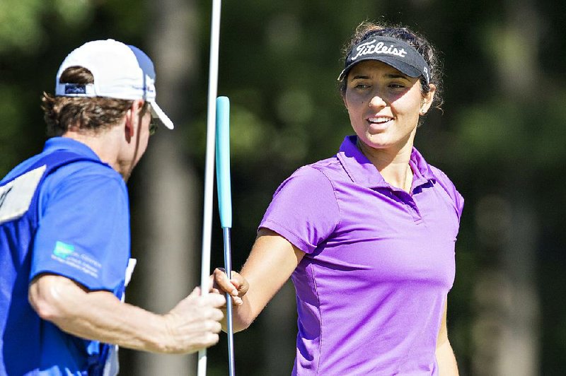 Former Arkansas Razorback Emily Tubert leads the Symetra’s Tour El Dorado Shootout with a 4-under-par 68 at Mystic Creek Golf Course in El Dorado.