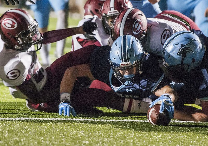 NWA Democrat-Gazette/ANTHONY REYES ‚Ä¢ @NWATONYR
Logan Collins (25) Springdale Har-Ber junior, reaches the ball across the goal line for a touchdown against Springdale Friday, Sept. 30, 2016 at Wildcat Stadium in Springdale. 