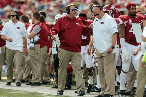 Arkansas' head coach Bret Bielema, center, yells instructions to his players during the second half of an NCAA football game against Alcorn State on Saturday, Oct. 1, 2016, in Little Rock, Ark. Arkansas beat Alcorn State, 52-10. (AP Photo/Chris Brashers)

