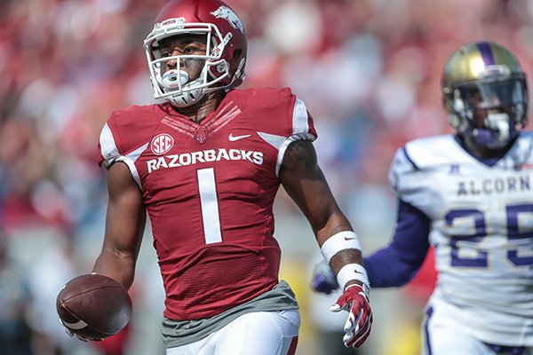Arkansas wide receiver Jared Cornelius scores a touchdown during the first quarter of an NCAA football game against Alcorn State, Saturday, Oct. 1, 2016, in Little Rock, Ark. (AP Photo/ Chris Brashers)

