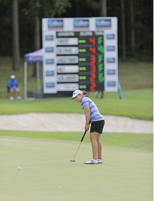 Michael Orrell/News-Times Dana Finkelstein attempts a putt on the 18th green. The Murphy USA El Dorado Shootout teed off Friday at Mystic Creek. Finkelstein, of Chandler, Ariz., shot a 75 and is in a tie for 42nd after one round.