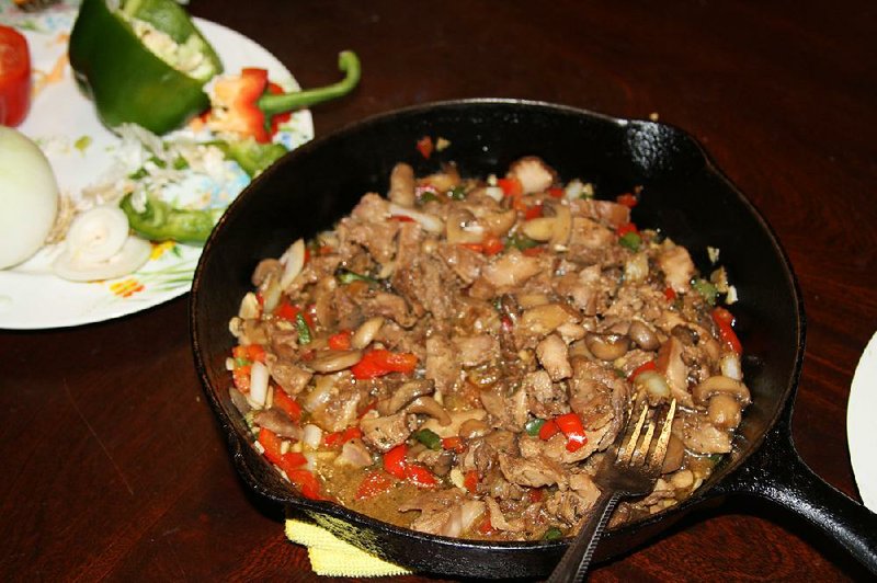 Marinated pheasant stir-fried with red and green bell peppers, garlic and mushrooms is excellent on a bed of rice or noodles.