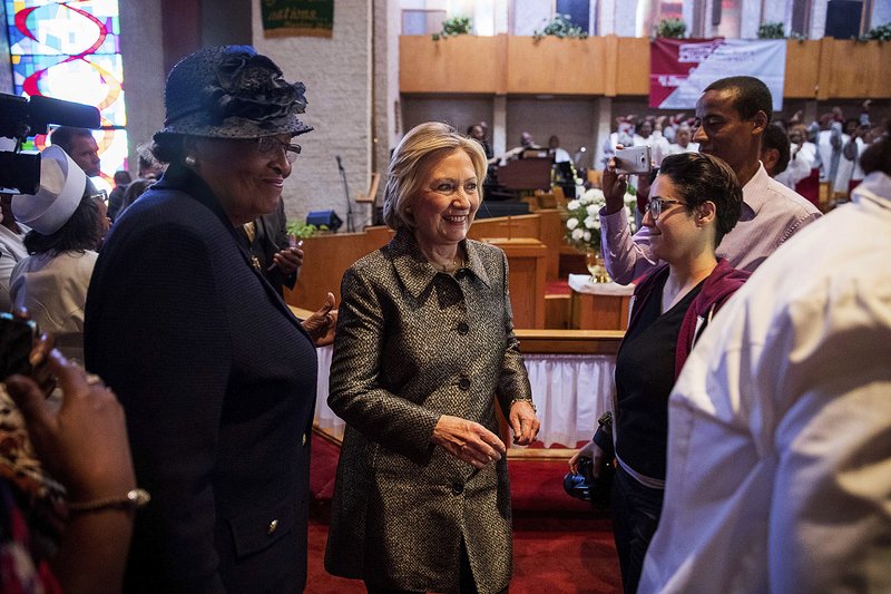 Democratic presidential candidate Hillary Clinton takes her seat after speaking at the Little Rock AME Zion Church in Charlotte, N.C., on Sunday.