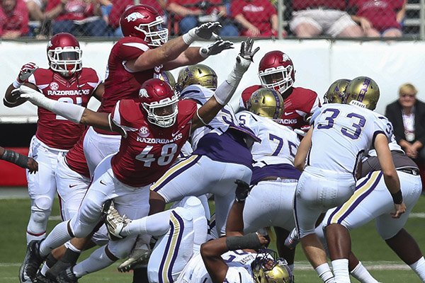 Arkansas offensive lineman Dan Skipper blocks a field goal during a game against Alcorn State on Saturday, Oct. 1, 2016, in Little Rock. 