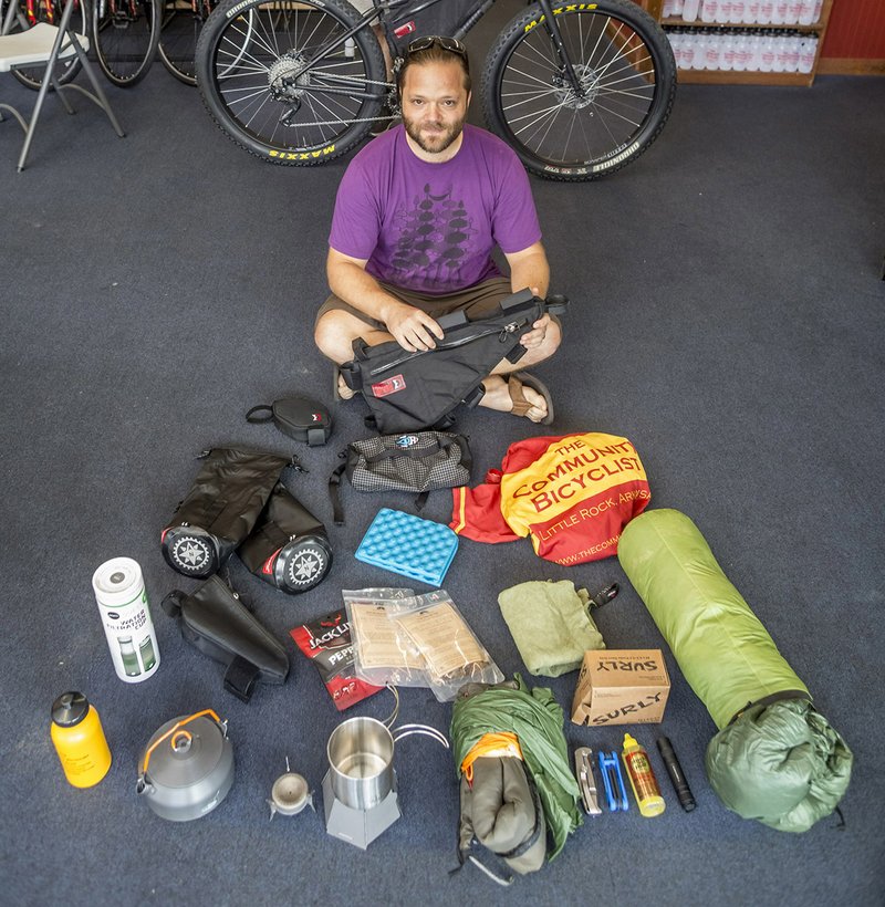 It all gets packed. Phillip Scalfano spreads out his bikepacking gear at Community Bicyclist in Little Rock.