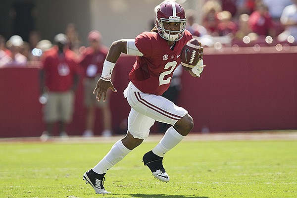 Alabama quarterback Jalen Hurts runs the ball during an NCAA college football game against Kent State, Saturday, Sept. 24, 2016, in Tuscaloosa, Ala. (AP Photo/Brynn Anderson)
Alabama quarterback Jalen Hurts runs the ball during an NCAA college football game against Kent State, Saturday, Sept. 24, 2016, in Tuscaloosa, Ala. (AP Photo/Brynn Anderson)