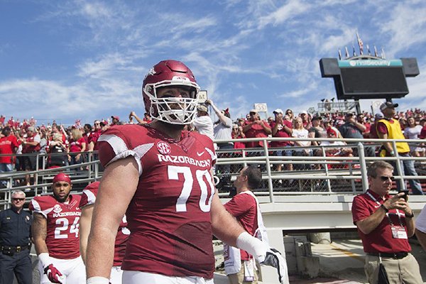 Arkansas offensive lineman Dan Skipper takes the field prior to a game against Alcorn State on Saturday, Oct. 1, 2016, at War Memorial Stadium in Little Rock. 