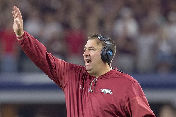 Arkansas coach Bret Bielema motions from the sideline during a game against Texas A&M on Saturday, Sept. 24, 2016, in Arlington, Texas. 