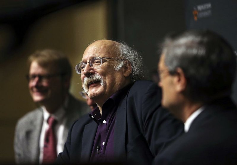 F. Duncan Haldane addresses a gathering Tuesday at Princeton University in Princeton, N.J., after it was announced that he has been awarded the 2016 Nobel Prize in physics.