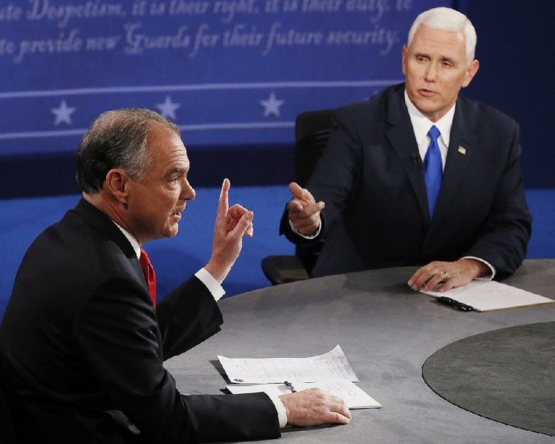 The vice presidential debate between Democrat Tim Kaine (left) and Republican Mike Pence quickly turned bitter Tuesday night as the candidates attacked with sharply different strategies.