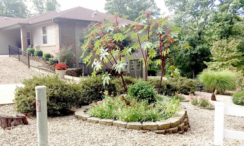 Photo by Alycyn Culbertson Ralph and Mary Bredl&#8217;s yard was selected as the October 2016 Yard of the Month.