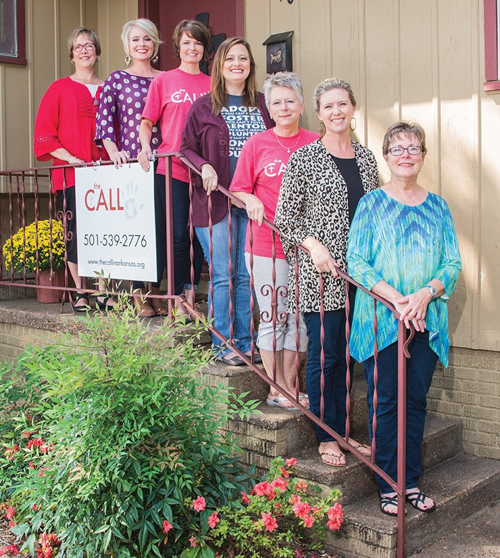 From left, Alyce Chapin, ministry house manager; Ashley Herring, Cleburne County coordinator; Felicia Stone, family support coordinator; Carmen George, data base and media coordinator; Vangie Stone, volunteer coordinator and church representative; Valerie Griesse, events coordinator; and Carol Balder, emergency assistant team coordinator and data processor for the CALL; stand outside the organization’s facility in Heber Springs. The CALL trains area families to become foster parents. There were 4,971 children in foster care in Arkansas in the third quarter of the fiscal year, which is a 4 percent increase from the previous quarter.