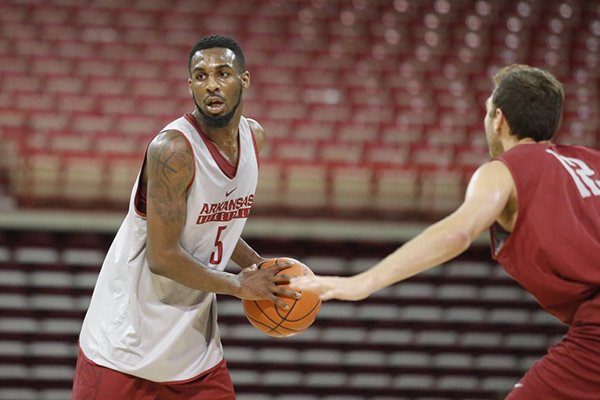 Arkansas' Arlando Cook goes through practice Wednesday, Oct. 5, 2016, at Bud Walton Arena in Fayetteville. 