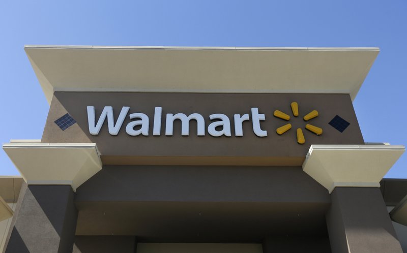 FILE - This Sept. 19, 2013, file photo, shows the sign of a Wal-Mart store in San Jose, Calif.  (AP Photo/Jeff Chiu, File)
