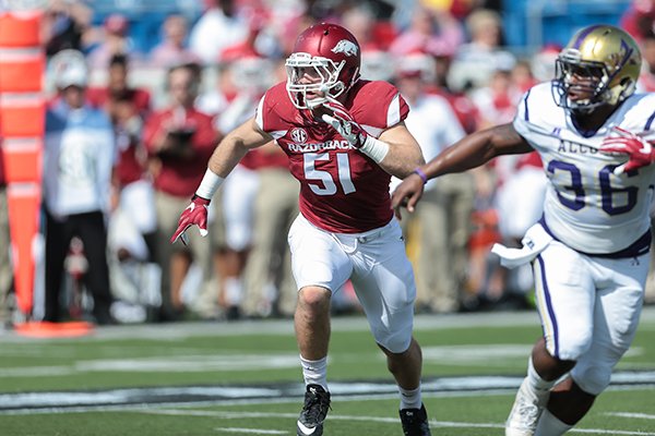 Arkansas' Brooks Ellis pursues the play during the first quarter of the NCAA football game against Alcorn St. on Saturday, Oct. 1, 2016, in Little Rock, AR. Arkansas beat Alcorn St., 52-10. (AP Photo/Chris Brashers)

