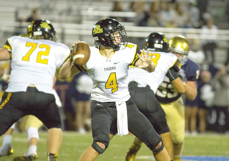 Zeke Laird of Prairie Grove winds up to throw Friday against Shiloh Christian at Champion Stadium in Springdale.